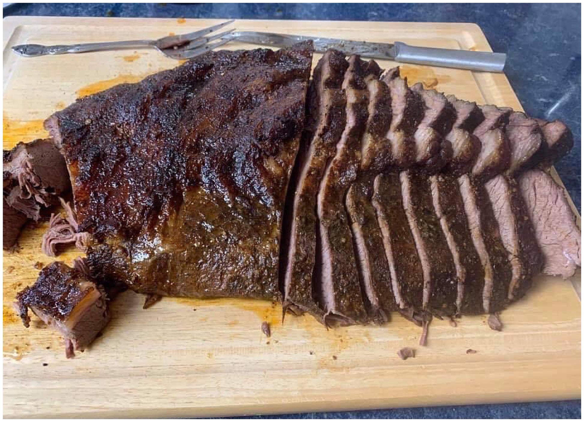A beautifully marbled brisket from our family farm, showcasing its rich texture and fresh, farm-raised quality, perfect for smoking, roasting, or braising.